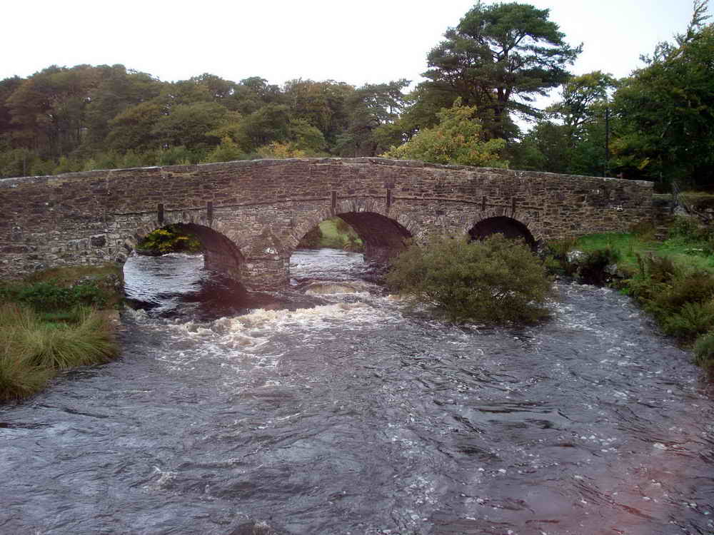 Looking upstream at the much later Postbridge Road Bridge