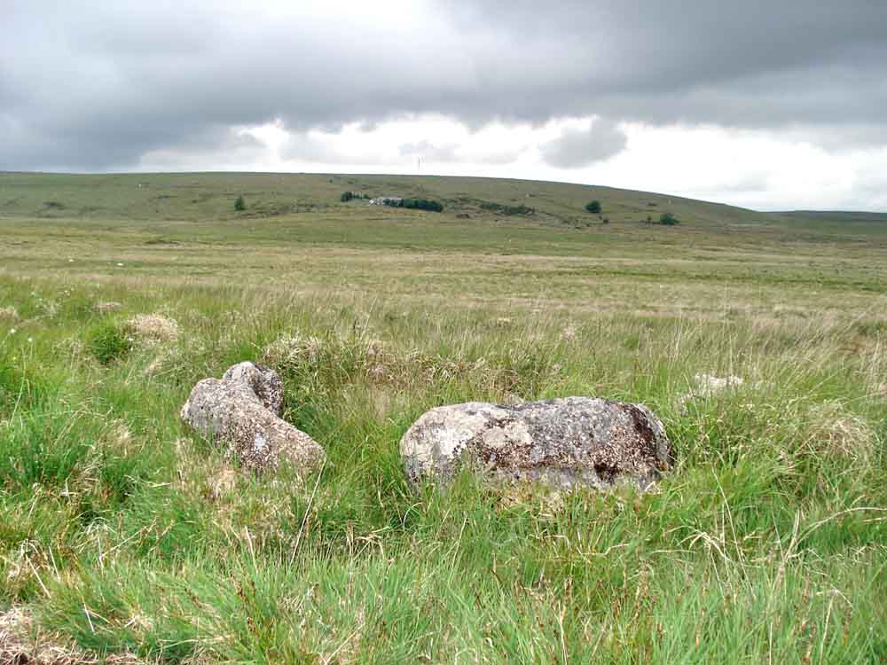 The cist with Whiteworks in the distance, across the mire