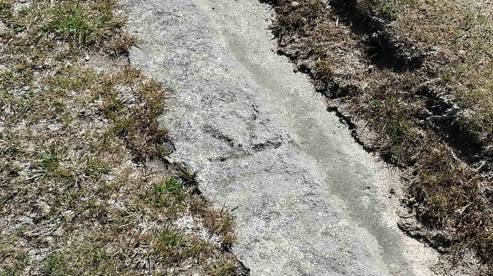 Rail with inscribed “K” at SX 76140 77728, a mason’s mark